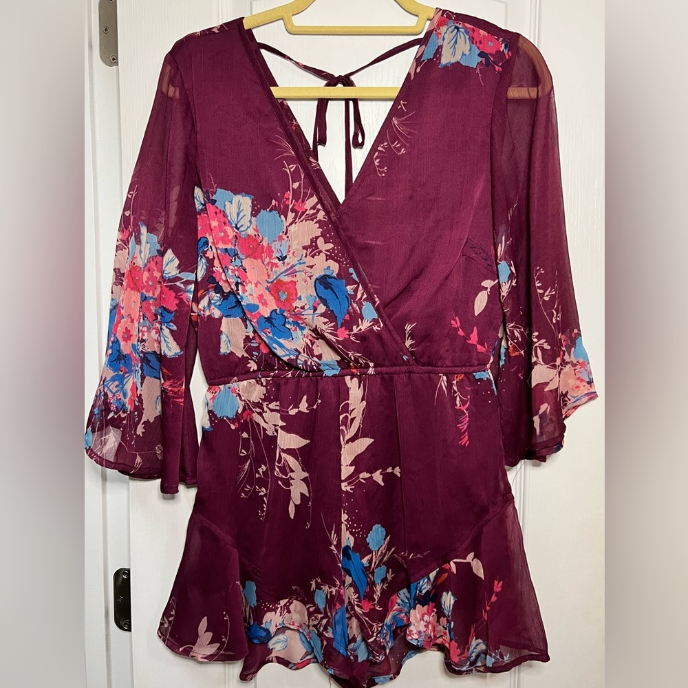 Flowy, deep v front and back, romper
